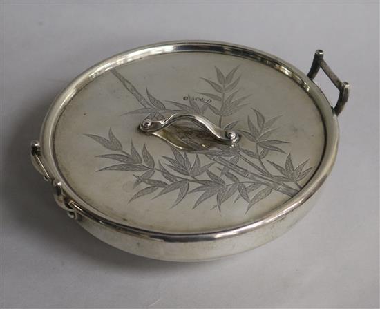 A Victorian silver two handled butter dish and cover by Hukin & Heath, in the manner of Christopher Dresser, 8.5 oz.